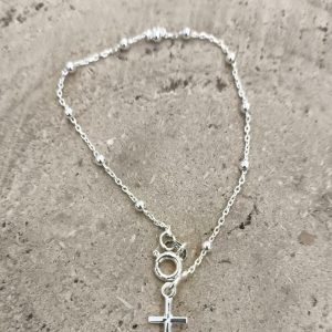 Pulsera cruz con bolitas en plata de ley